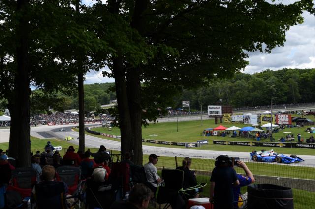 Scott Dixon leads the field up the hill toward Turn 6 during the KOHLER Grand Prix at Road America -- Photo by: Chris Owens
