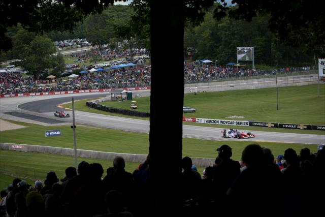 Fans watch Conor Daly and Mikhail Aleshin streak out of Turn 5 during the KOHLER Grand Prix at Road America -- Photo by: Joe Skibinski