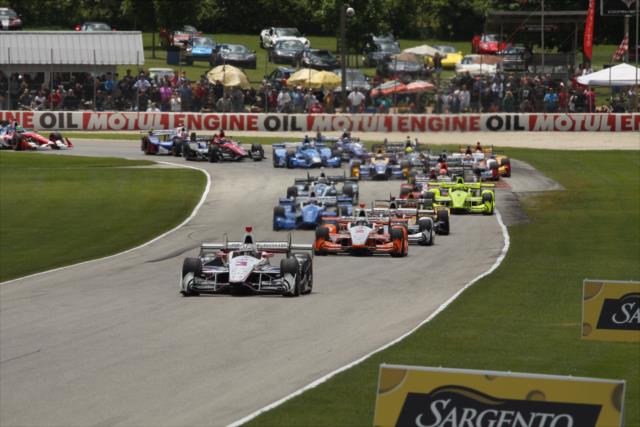 Helio Castroneves leads the field toward the Moraine Sweep toward Turn 4 during the KOHLER Grand Prix at Road America -- Photo by: Matt Fraver