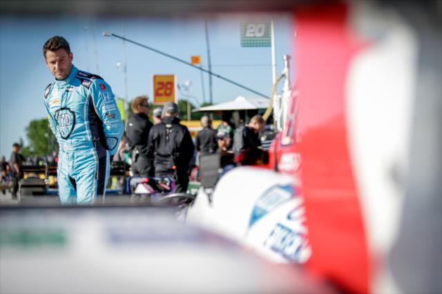 Marco Andretti looks over his No. 27 Andretti Autosport Honda on pit lane prior to the final warmup for the KOHLER Grand Prix at Road America -- Photo by: Shawn Gritzmacher