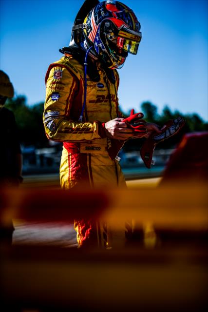 Ryan Hunter-Reay preps his gloves on pit lane prior to the final warmup for the KOHLER Grand Prix at Road America -- Photo by: Shawn Gritzmacher