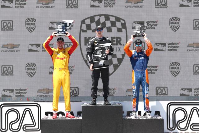 The podium of Josef Newgarden, Ryan Hunter-Reay, and Scott Dixon with their trophies in Victory Lane following the KOHLER Grand Prix at Road America -- Photo by: Chris Jones