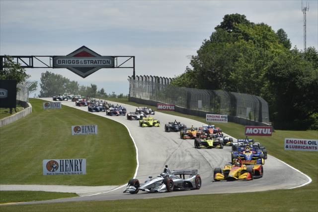 Josef Newgarden leads the field into Turn 3 during the opening lap of the KOHLER Grand Prix at Road America -- Photo by: Chris Owens