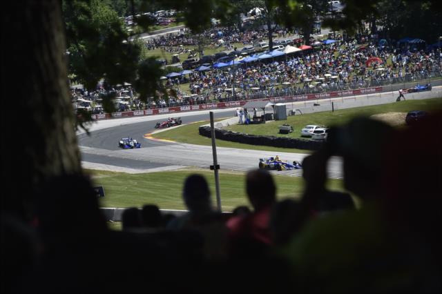Alexander Rossi leads a group through Turn 5 during the KOHLER Grand Prix at Road America -- Photo by: Chris Owens
