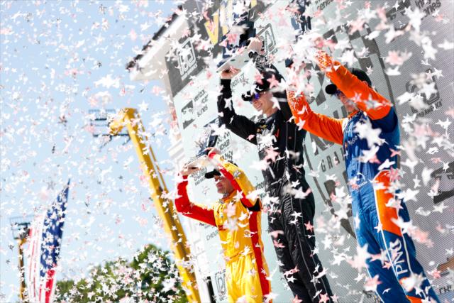 The podium of Josef Newgarden, Ryan Hunter-Reay, and Scott Dixon hoist their trophies in Victory Lane following the KOHLER Grand Prix at Road America -- Photo by: Joe Skibinski
