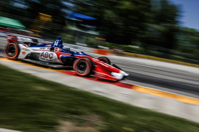Tony Kanaan hammers the apex of Canada Corner (Turn 12) during the KOHLER Grand Prix at Road America -- Photo by: Shawn Gritzmacher
