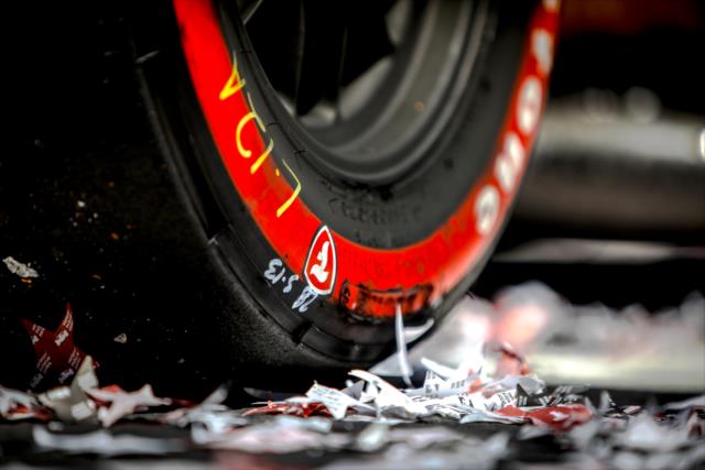 The confetti adorns the winning Firestone Alternate Red tires on Josef Newgarden's car in Victory Lane after taking him to victory in the KOHLER Grand Prix at Road America -- Photo by: Shawn Gritzmacher