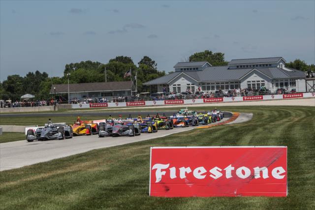 Josef Newgarden and Will Power lead the field to the green flag to start the KOHLER Grand Prix at Road America -- Photo by: Shawn Gritzmacher