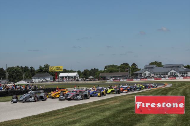 Josef Newgarden and Will Power lead the field out of Turn 14 prior to the start of the KOHLER Grand Prix at Road America -- Photo by: Shawn Gritzmacher