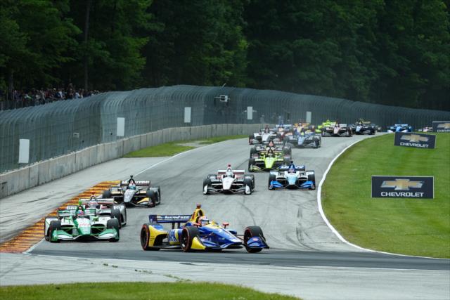 Alexander Rossi leads the field at into turn 5 on the first lap of the REV Group Grand Prix at Road America -- Photo by: James  Black