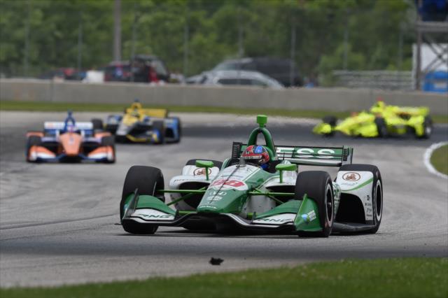 Colton Herta leads a pack out of turn 8 and into the Carousel -- Photo by: John Cote