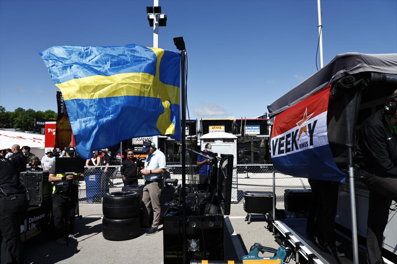Marcus Ericsson with a Sweden flag pits next to Rinus VeeKay as he displays a flag representing the Netherlands - XPEL Grand Prix at Road America - By: Chris Jones -- Photo by: Chris Jones