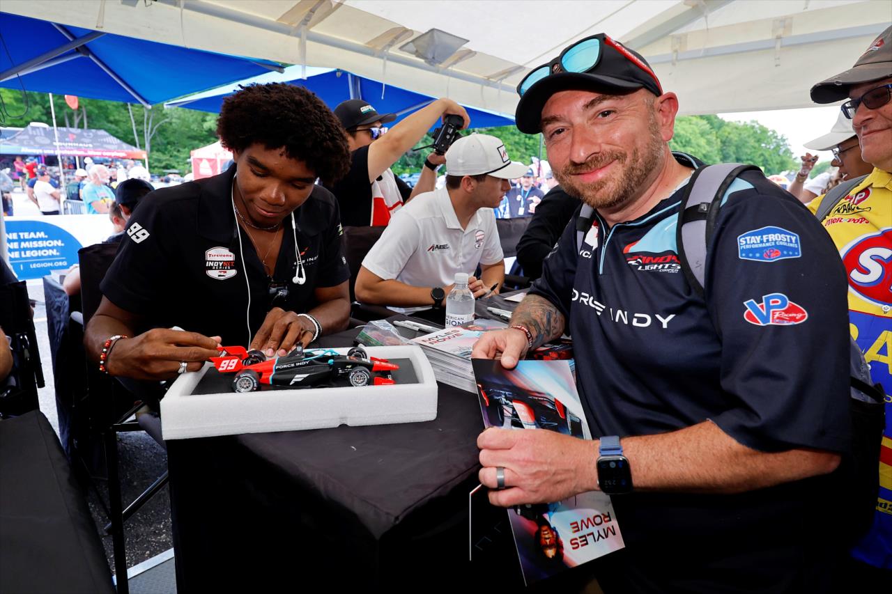 Myles Rowe with a fan - Grand Prix at Road America - INDY NXT Presented by Firestone - By: Paul Hurley -- Photo by: Paul Hurley