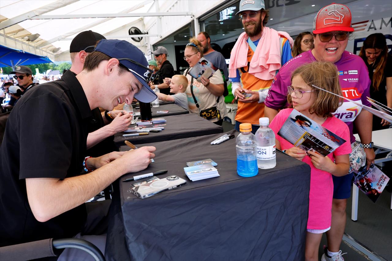 Carson Etter with a fan - Grand Prix at Road America - INDY NXT Presented by Firestone - By: Paul Hurley -- Photo by: Paul Hurley