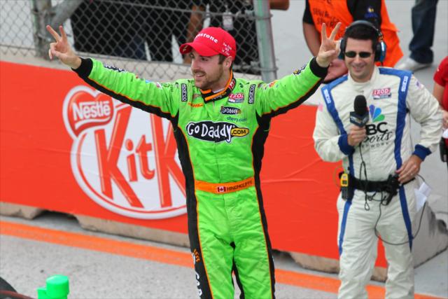 James Hinchcliffe celebrates victory in Sao Paulo as Kevin Lee waits to interview -- Photo by: Chris Jones