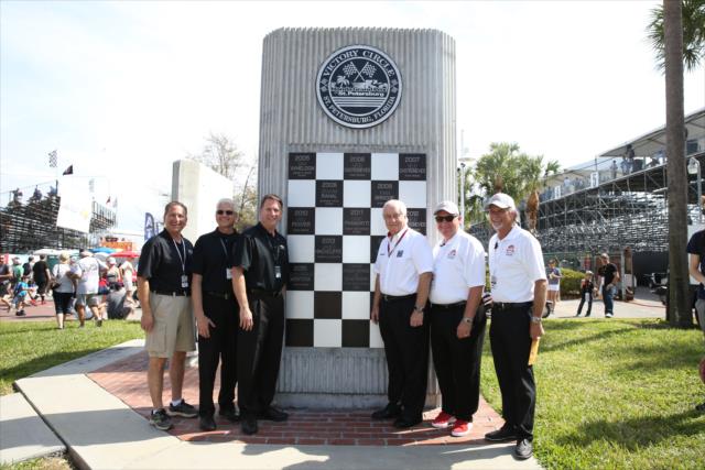 Roger Penske is honored for his 50th year in racing on the Dan Wheldon Memorial Monument in St. Petersburg -- Photo by: Chris Jones