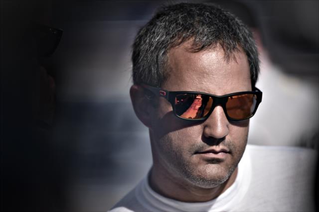 Juan Pablo Montoya waits along pit lane prior to qualifications for the Firestone Grand Prix of St. Petersburg -- Photo by: John Cote