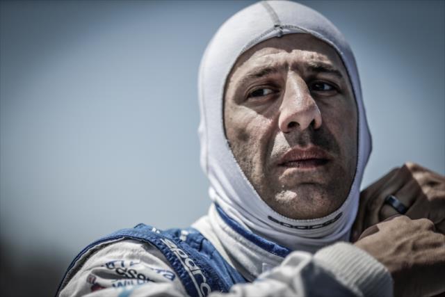 Tony Kanaan adjusts his balaclava prior to practice for the Firestone Grand Prix of St. Petersburg -- Photo by: Shawn Gritzmacher