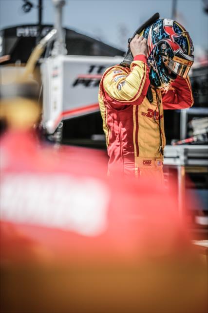 Ryan Hunter-Reay adjusts his helmet along pit lane prior to practice for the Firestone Grand Prix of St. Petersburg -- Photo by: Shawn Gritzmacher
