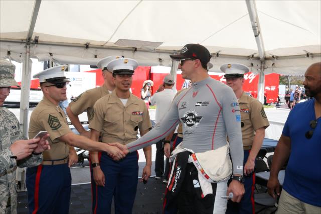 Graham Rahal greets members of MacDill Air Force Base Special Operations Command in the Ed Carpenter Racing paddock in St. Petersburg -- Photo by: Chris Jones