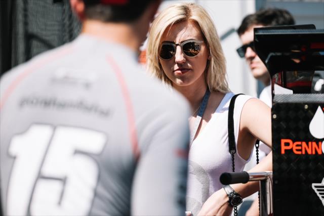 Courtney Force chats with her husband, Graham Rahal, on pit lane following practice for the Firestone Grand Prix of St. Petersburg -- Photo by: Joe Skibinski