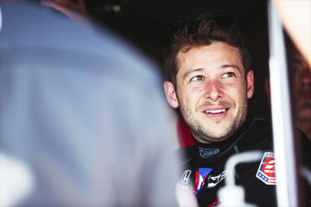 Marco Andretti chats with his team following practice for the Firestone Grand Prix of St. Petersburg -- Photo by: Joe Skibinski