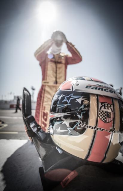 Ryan Hunter-Reay adjusts his balaclava along pit lane prior to practice for the Firestone Grand Prix of St. Petersburg -- Photo by: Shawn Gritzmacher