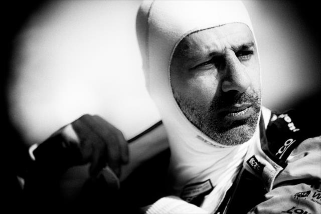 Tony Kanaan adjusts his firesuit prior to practice for the Firestone Grand Prix of St. Petersburg -- Photo by: Shawn Gritzmacher