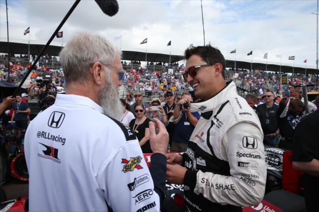 Graham Rahal and team co-owner David Letterman chat on pit lane during pre-race festivities for the Firestone Grand Prix of St. Petersburg -- Photo by: Chris Jones