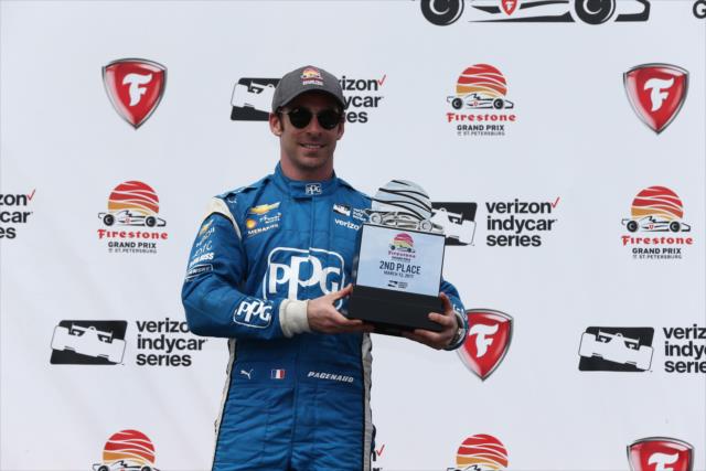 Simon Pagenaud accepts his 2nd Place trophy in Victory Circle following the Firestone Grand Prix of St. Petersburg -- Photo by: Chris Jones