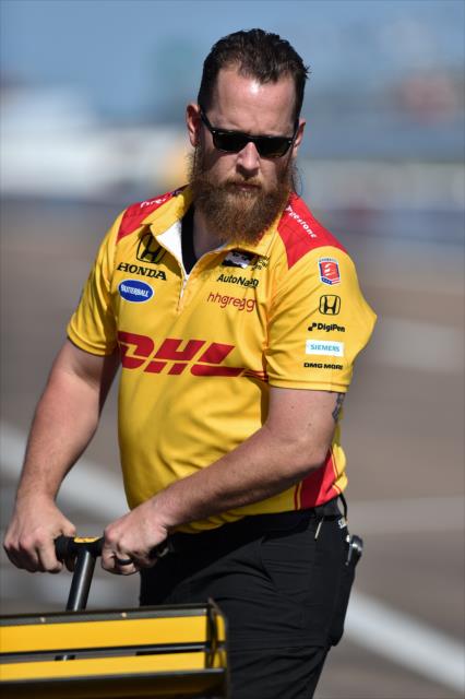 An Andretti Autosport engineer works on the No. 28 DHL Honda on pit lane during the final warmup for the Firestone Grand Prix of St. Petersburg -- Photo by: Chris Owens