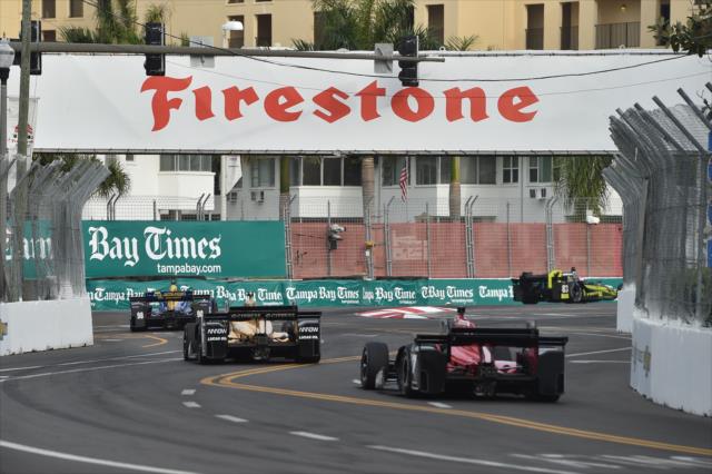 The field streams through Turns 2 & 3 during the Firestone Grand Prix of St. Petersburg -- Photo by: Chris Owens