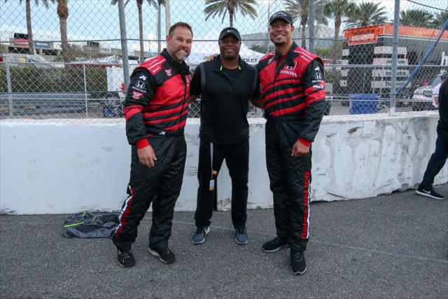 Ken Griffey Jr. poses with former Tampa Bay Buccaneer fullback Mike Alstott and NFL wide receiver Vincent Jackson before they take a ride in the two seater at the Firestone Grand Prix of St. Petersburg. -- Photo by: Joe Skibinski