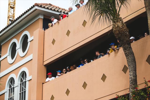 Fans watch the track activity from the high-rise buildings surrounding the streets of St. Petersburg -- Photo by: Joe Skibinski