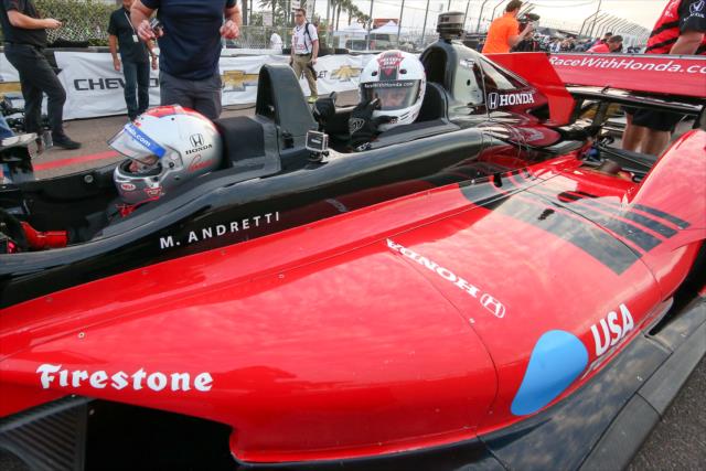 Former Tampa Bay Buccaneer fullback Mike Alstott getting ready to take a ride in the two seater at the Firestone Grand Prix of St. Petersburg. -- Photo by: Joe Skibinski