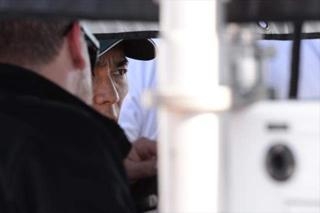 Takuma Sato chats with his team in his pit stand during practice for the Firestone Grand Prix of St. Petersburg -- Photo by: James  Black