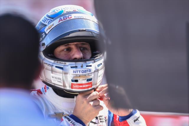 Tony Kanaan tightens his helmet along pit lane prior to practice for the Firestone Grand Prix of St. Petersburg -- Photo by: James  Black
