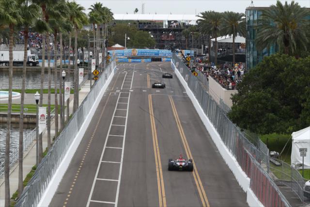 Cars stream down the backstretch during practice for the Firestone Grand Prix of St. Petersburg -- Photo by: Chris Jones