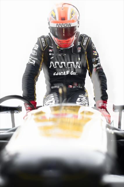 James Hinchcliffe slides into his No. 5 Arrow Honda on pit lane prior to qualifications for the Firestone Grand Prix of St. Petersburg -- Photo by: Chris Owens