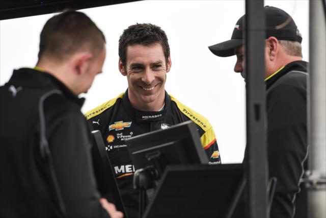 Simon Pagenaud chats with his team along pit lane prior to practice for the Firestone Grand Prix of St. Petersburg -- Photo by: James  Black