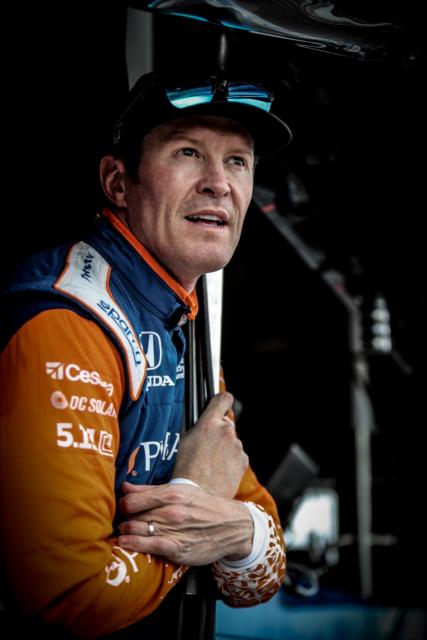 Scott Dixon watches the final round of qualifications the Firestone Grand Prix of St. Petersburg from his pit stand -- Photo by: Shawn Gritzmacher
