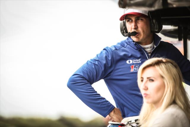 Graham Rahal and his wife, Courtney Force, watch the final round of qualifications for the Firestone Grand Prix of St. Petersburg -- Photo by: Shawn Gritzmacher