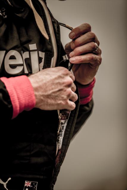 Will Power adjusts his firesuit along pit lane prior to qualifications for the Firestone Grand Prix of St. Petersburg -- Photo by: Shawn Gritzmacher
