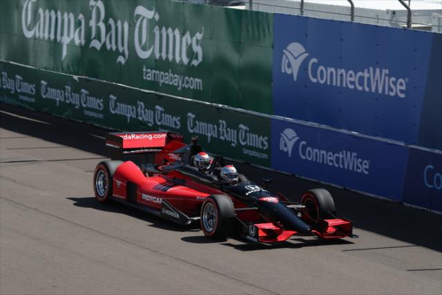 Mario Andretti pilots the two-seater down the frontstretch during the parade laps of the Firestone Grand Prix of St. Petersburg -- Photo by: Chris Jones
