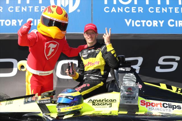 Sebastien Bourdais with the Firestone Firehawk in Victory Circle after during the Firestone Grand Prix of St. Petersburg -- Photo by: Chris Jones