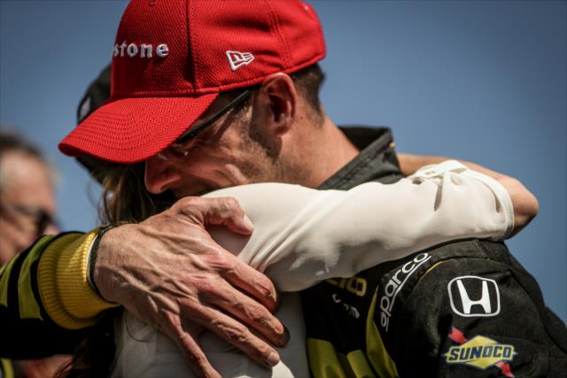 Sebastien Bourdais gets a warm hug from his wife Claire after winning the Firestone Grand Prix of St. Petersburg -- Photo by: Shawn Gritzmacher