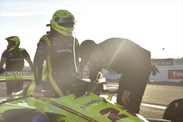Simon Pagenaud slides into his No. 22 Menards Chevrolet on pit lane prior to the final warmup for the Firestone Grand Prix of St. Petersburg -- Photo by: Chris Owens