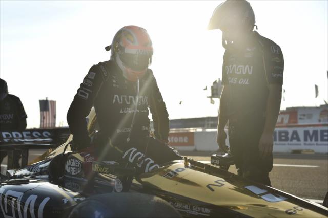 James Hinchcliffe slides into his No. 5 Arrow Honda on pit lane prior to the final warmup for the Firestone Grand Prix of St. Petersburg -- Photo by: Chris Owens