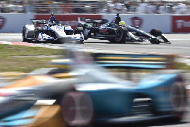 Graham Rahal and Spencer Pigot bang wheels through Turn 1 during the Firestone Grand Prix of St. Petersburg -- Photo by: Chris Owens