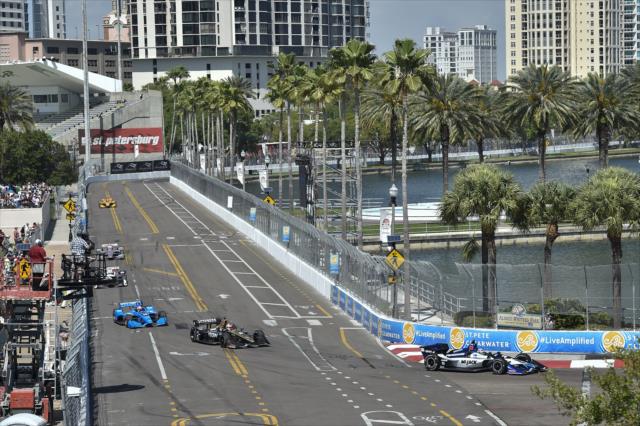 The field streams into Turn 10 during the Firestone Grand Prix of St. Petersburg -- Photo by: Chris Owens